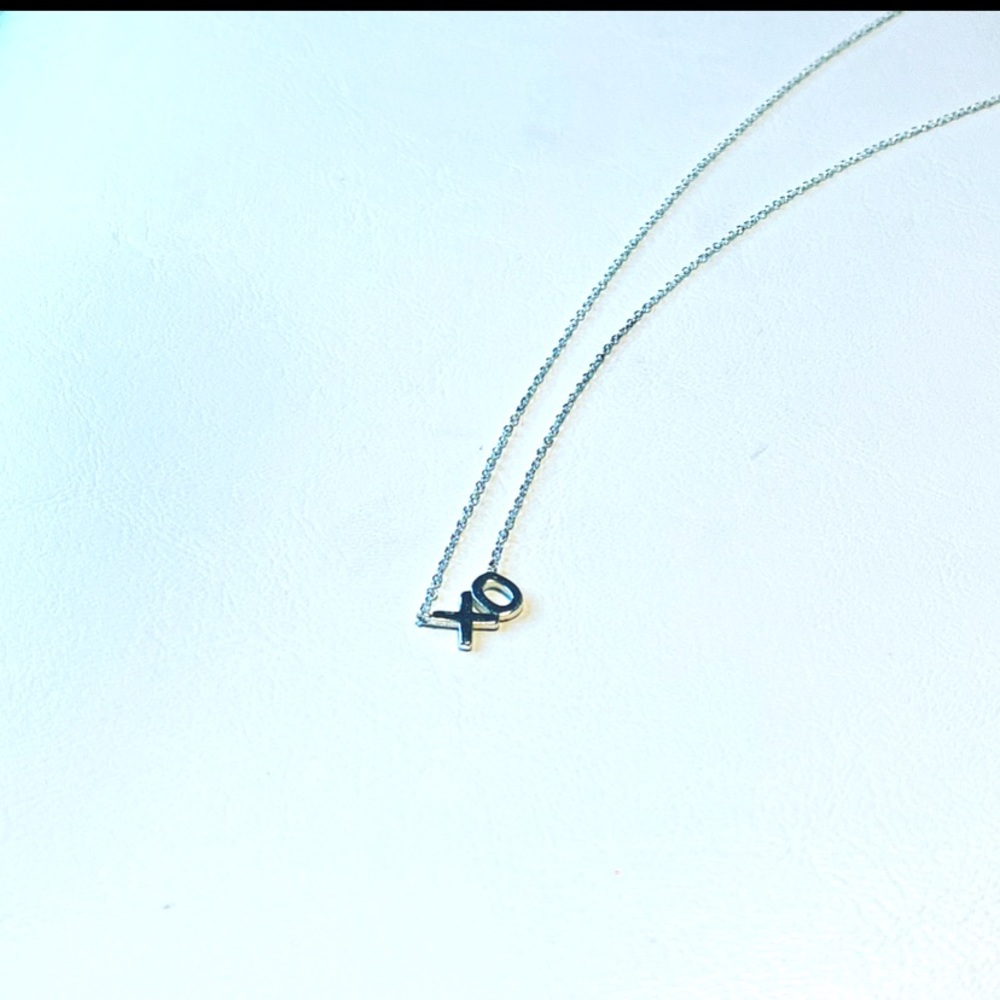 Sterling/925 silver XO necklace.
